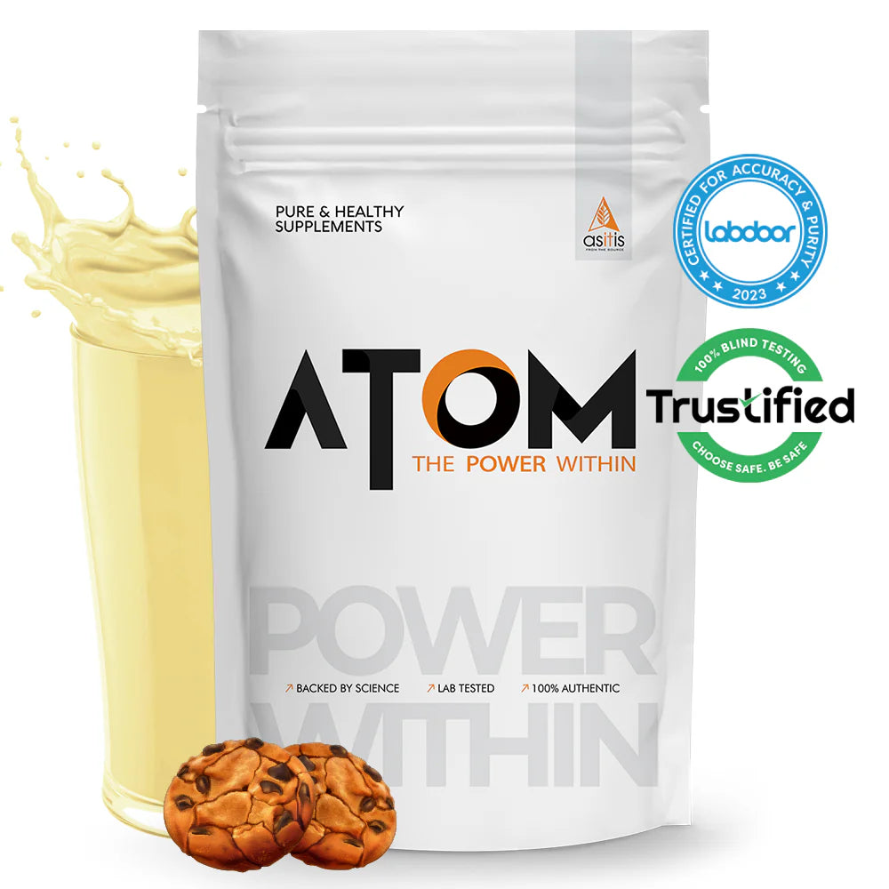 ATOM supplement package with cookies and a splash of milk on a white background
