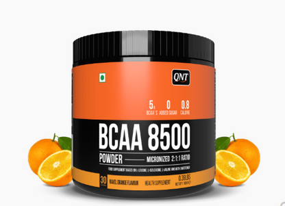 QNT BCAA 8500 powder container with oranges on a white background