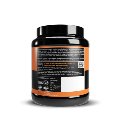 Black supplement container with orange and white label on a black background