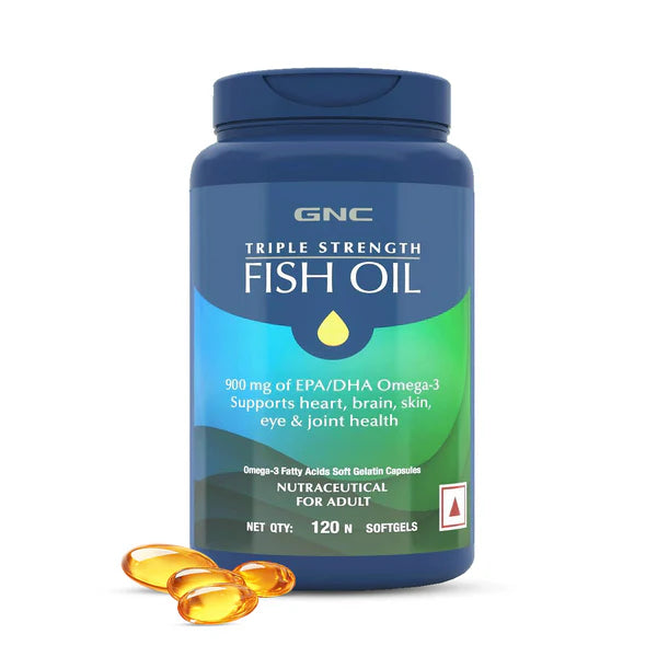 GNC Triple Strength Fish Oil bottle with two softgels on a white background
