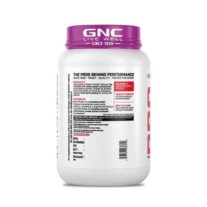 GNC protein supplement container with purple lid on a white background
