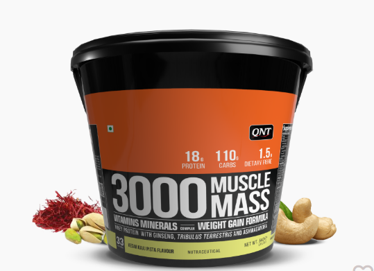 Container of QNT Muscle Mass 3000 weight gain formula with ingredients on a white background