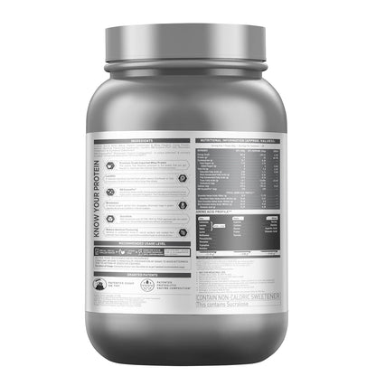Silver protein supplement container with label on a white background