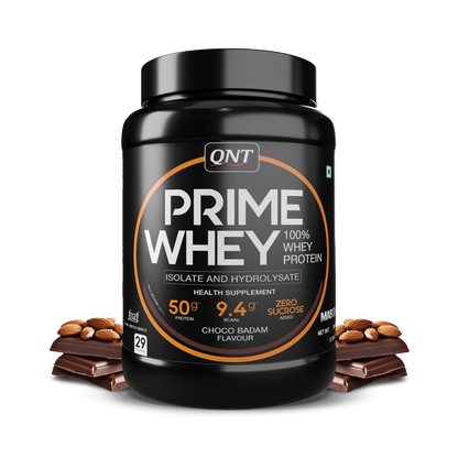 QNT Prime Whey protein powder container with chocolate and almonds on a white background