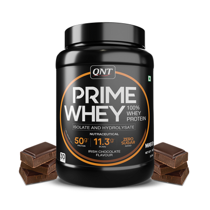 QNT Prime Whey protein powder container with chocolate bars on a white background