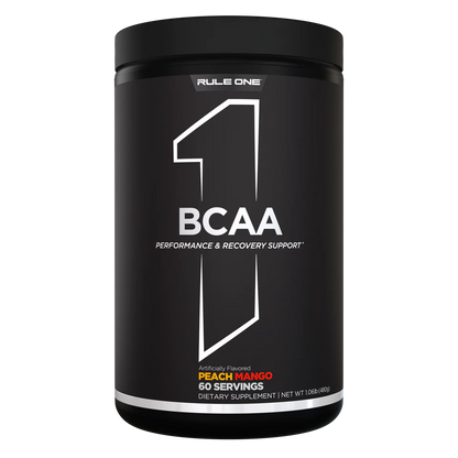 Black container of Rule One BCAA supplement with white text on a white background