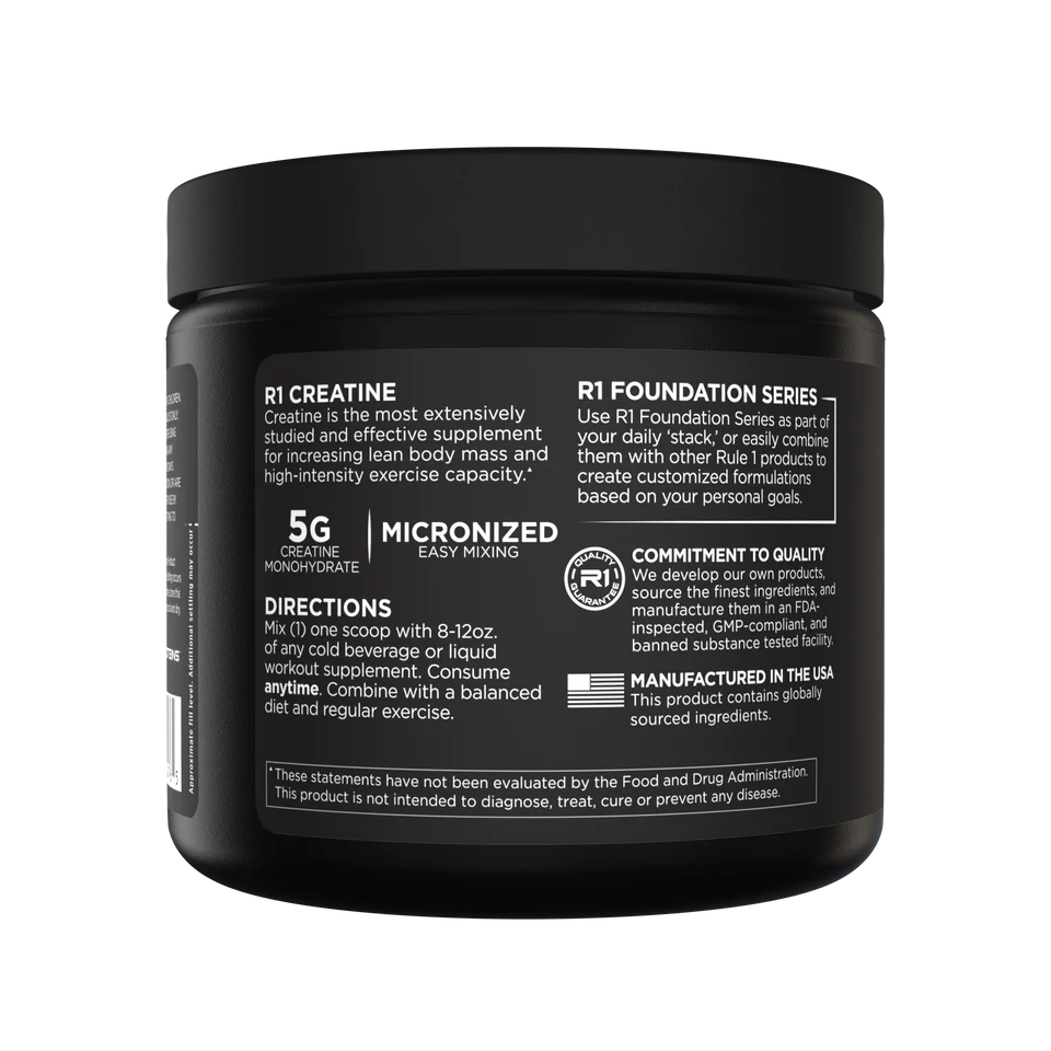 Black container of R1 Creatine supplement with white text on a white background