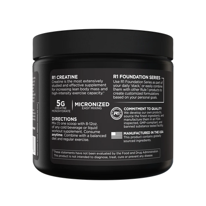 Black container of R1 Creatine supplement with white text on a white background