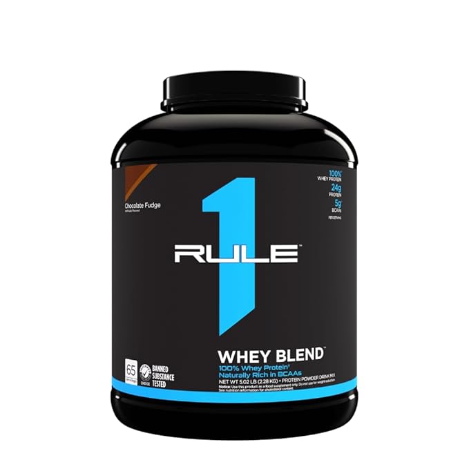 Rule 1 Whey Blend protein powder container on a white background