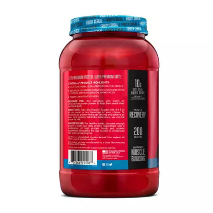 Red supplement bottle with blue cap on a white background